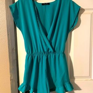 Honey Punch Turquoise Romper with scalloped edge bottoms.Size Small.